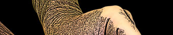 drawing of gloved hands inserting a needle